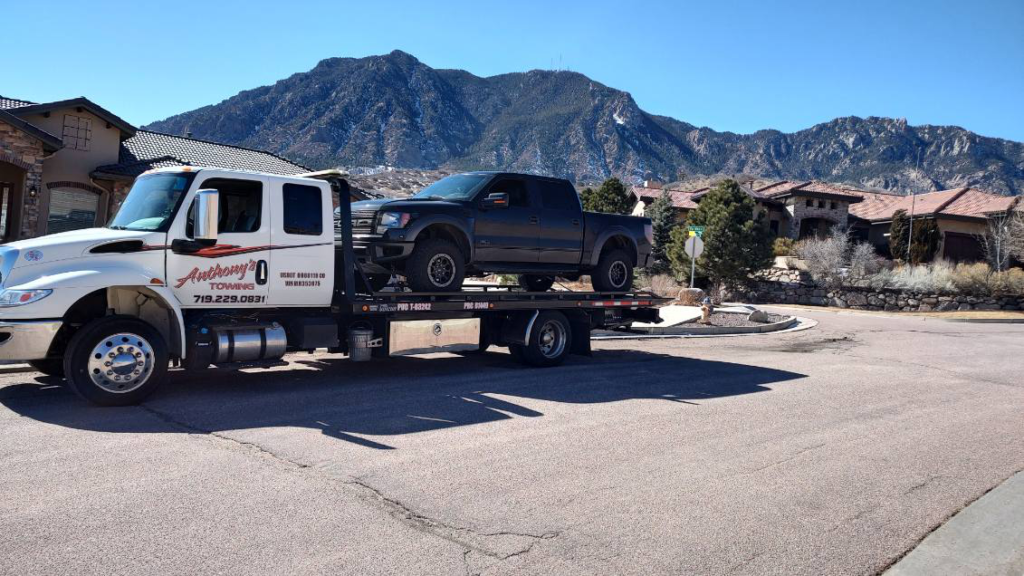 A Vehicle Being Towed in Colorado Due to Having Run Out of Car Fuel