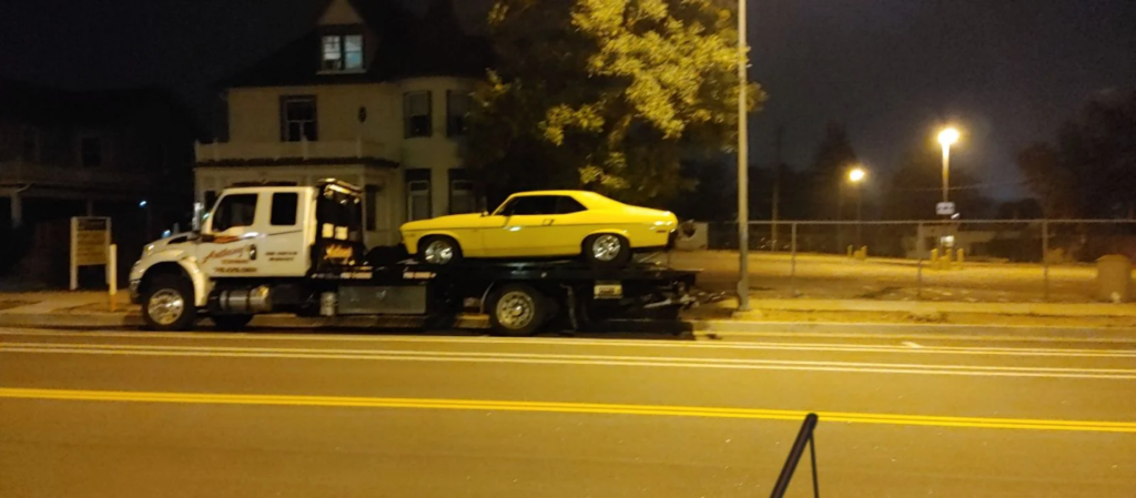  A White Car on a Tow Truck